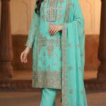 Luxurious Sea Green Georgette Pakistani Salwar Kameez with Heavy Zari & Mirror Work
